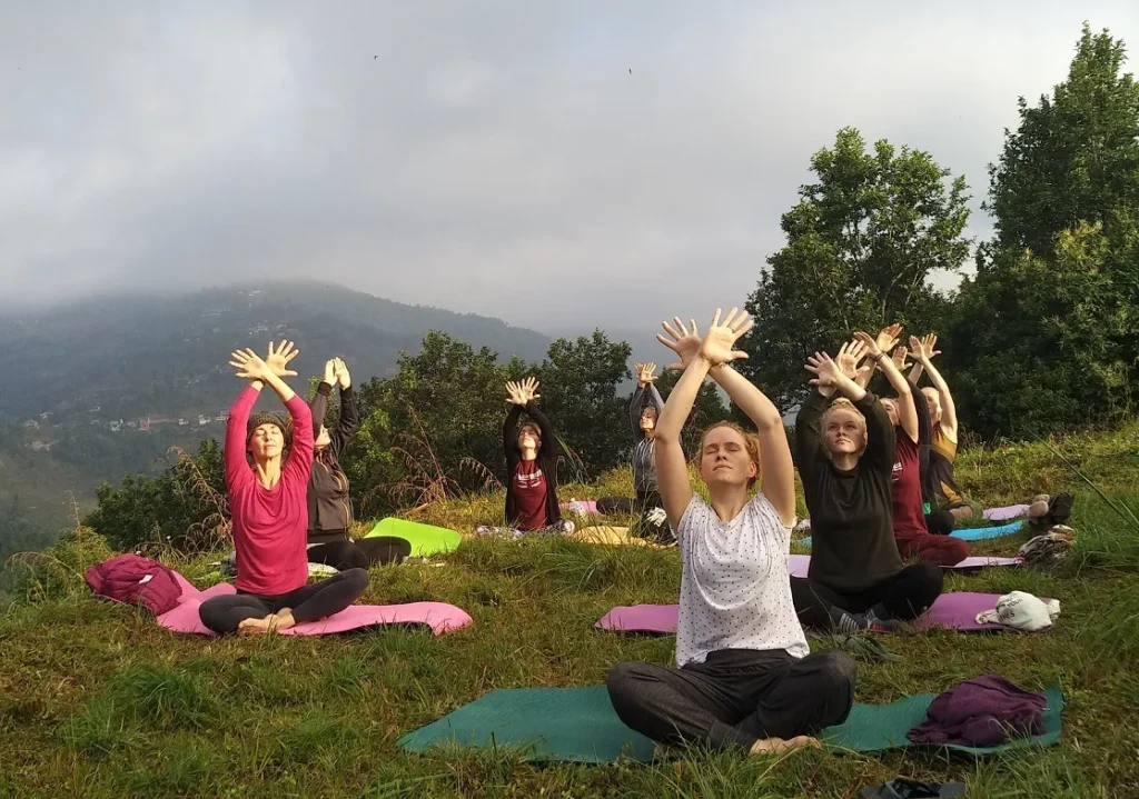 Students doing Yoga on Hill at Pokhara Nepal