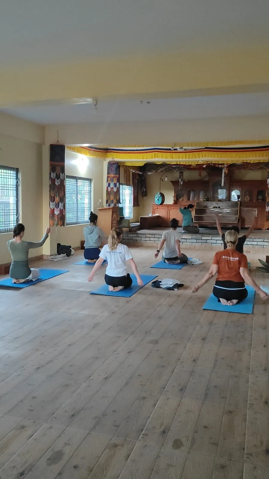 Another Photo of Students practicing in class room doing yoga teacher training course in Pokhara Nepal