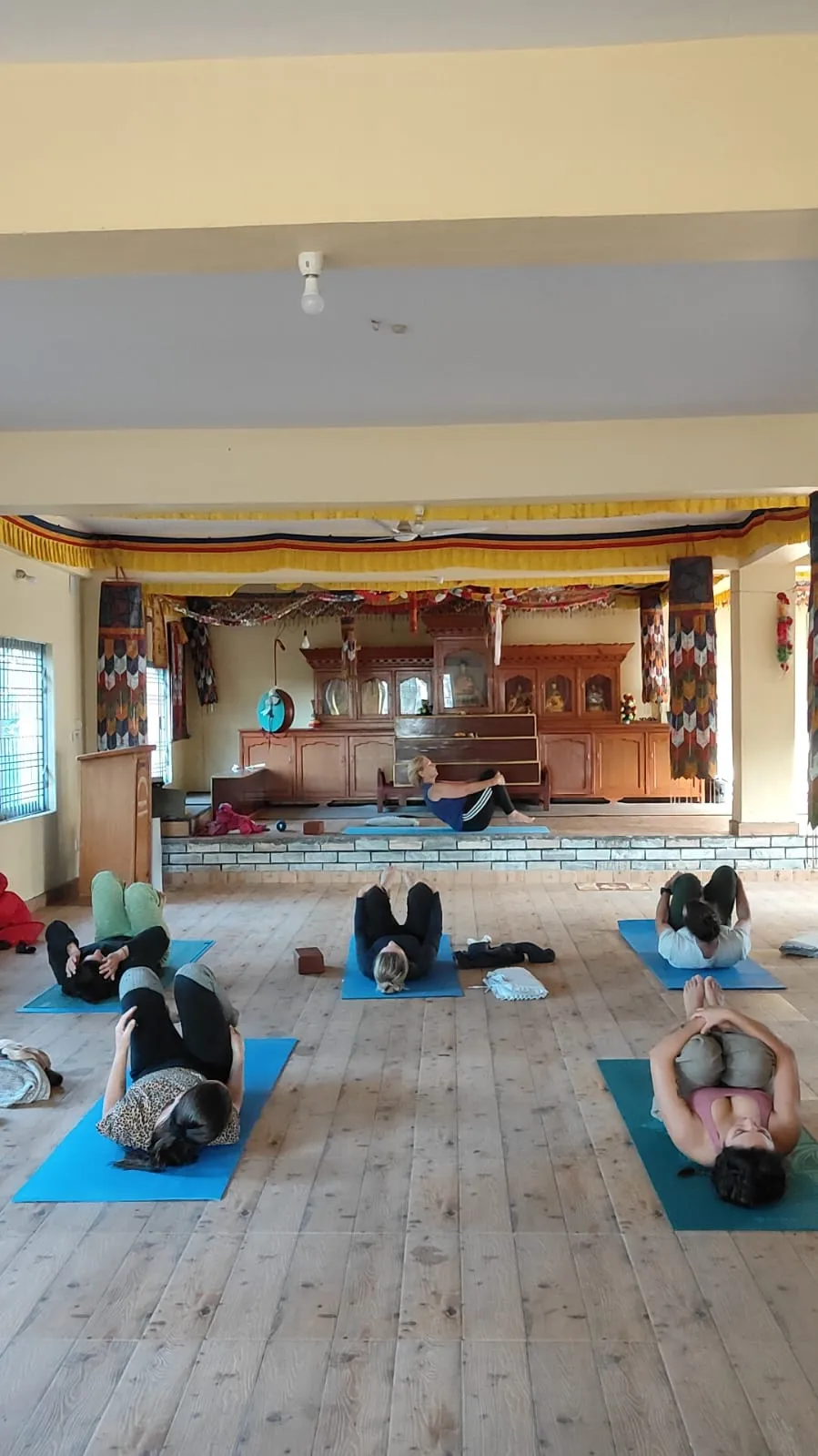 Photo of Students practicing in class room doing yoga teacher training course in Pokhara Nepal